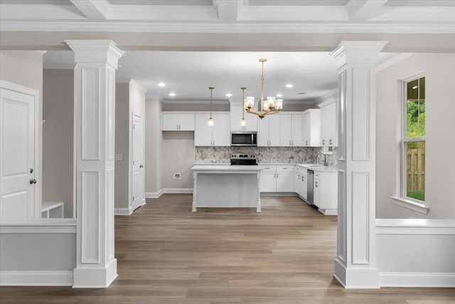 5085 Anna Way Unit Fb28, North Augusta, SC 29841 - kitchen featuring stainless steel appliances, decorative columns, light countertops, tasteful backsplash, and crown molding