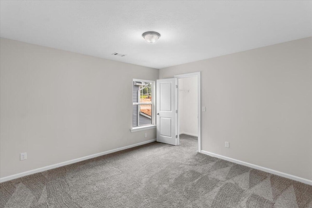 5085 Anna Way Unit Fb28, North Augusta, SC 29841 - unfurnished bedroom featuring carpet and a spacious closet