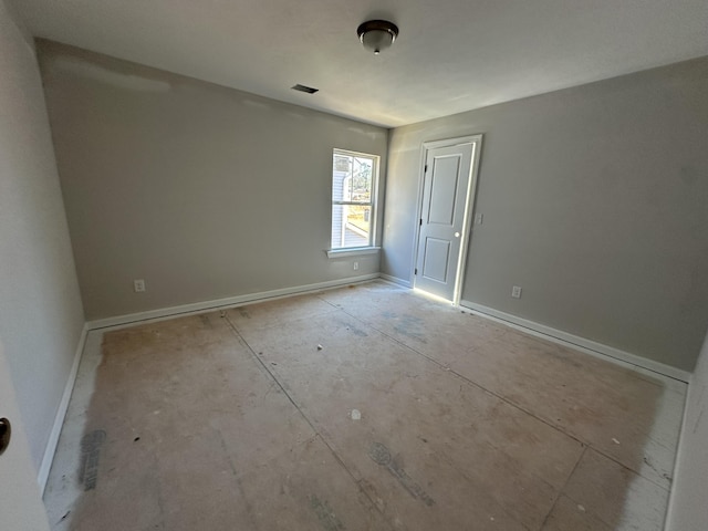 interior space featuring baseboards and visible vents