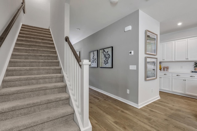 778 Count Fleet Ct, Graniteville, SC 29829 - stairway featuring baseboards, wood finished floors, and recessed lighting