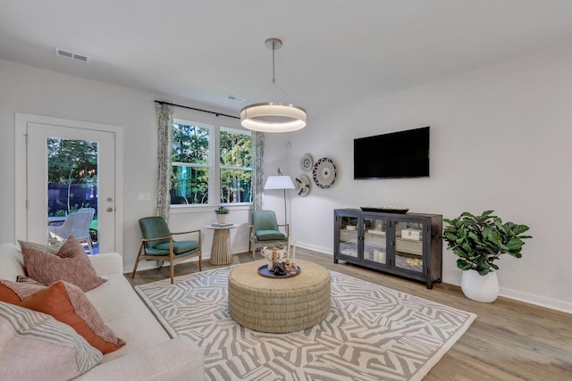 778 Count Fleet Ct, Graniteville, SC 29829 - living room with baseboards, visible vents, and wood finished floors
