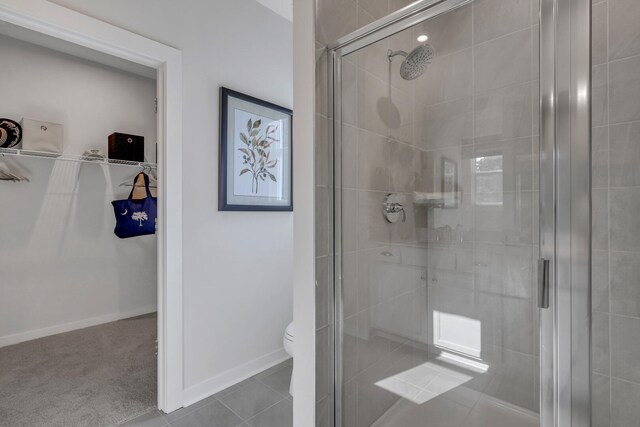 778 Count Fleet Ct, Graniteville, SC 29829 - bathroom featuring toilet, tile patterned floors, baseboards, and a shower stall