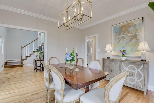 81 Two Mile Dr, Johnston, SC 29832 - dining area featuring wood finished floors, ornamental molding, stairs, and a chandelier
