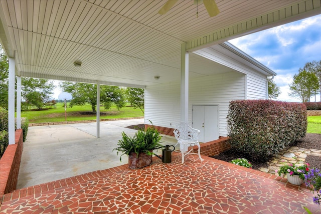 81 Two Mile Dr, Johnston, SC 29832 - view of patio with ceiling fan, an attached carport, and concrete driveway