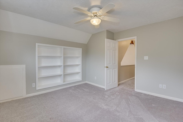 81 Two Mile Dr, Johnston, SC 29832 - carpeted empty room with ceiling fan, a textured ceiling, and built in shelves