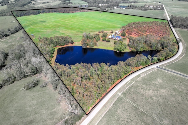 81 Two Mile Dr, Johnston, SC 29832 - aerial view of property and surrounding area with a nearby body of water, property boundaries highlighted, and rural landscape
