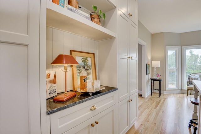 81 Two Mile Dr, Johnston, SC 29832 - bar area with light wood-style flooring and baseboards
