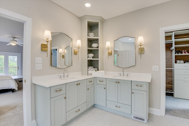 81 Two Mile Dr, Johnston, SC 29832 - full bathroom featuring connected bathroom, double vanity, ceiling fan, and a walk in closet