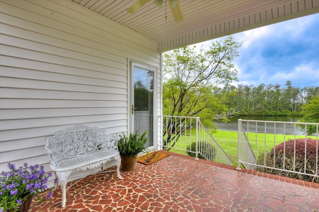 81 Two Mile Dr, Johnston, SC 29832 - view of patio with a ceiling fan and a water view