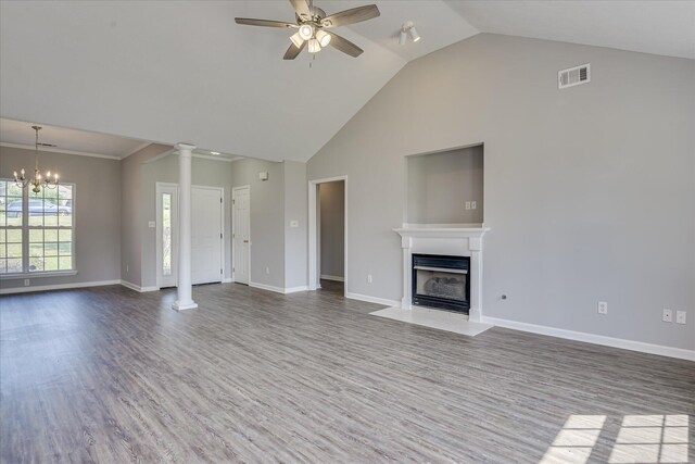 4620 Country Glen Cir, Grovetown, GA 30813 - unfurnished living room featuring wood finished floors, ceiling fan, ornate columns, a fireplace with flush hearth, and baseboards