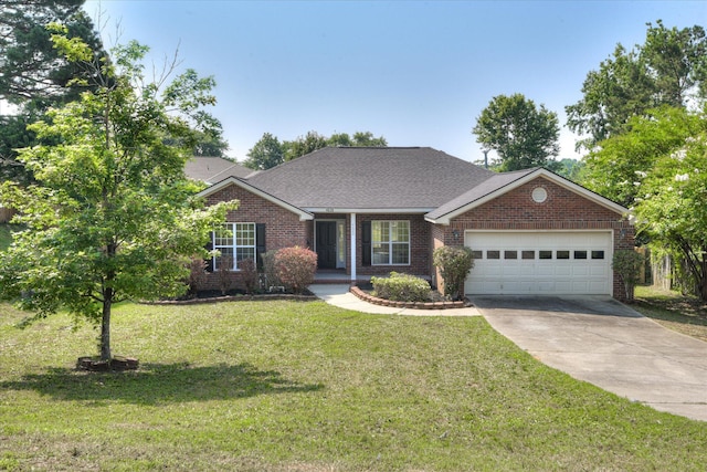 4620 Country Glen Cir, Grovetown, GA 30813 - view of front of property with brick siding, an attached garage, driveway, a front lawn, and a porch