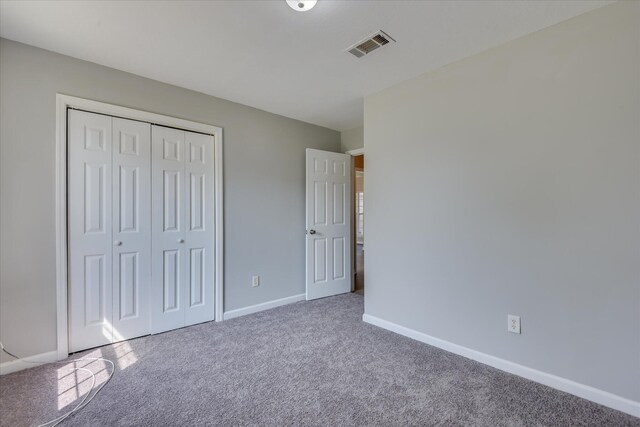 4620 Country Glen Cir, Grovetown, GA 30813 - unfurnished bedroom featuring carpet flooring, baseboards, and a closet