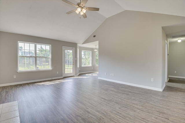 4620 Country Glen Cir, Grovetown, GA 30813 - unfurnished living room featuring ceiling fan, high vaulted ceiling, wood finished floors, and baseboards