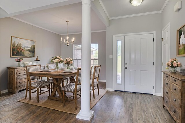 4620 Country Glen Cir, Grovetown, GA 30813 - foyer featuring dark wood-style flooring, baseboards, a chandelier, ornate columns, and ornamental molding