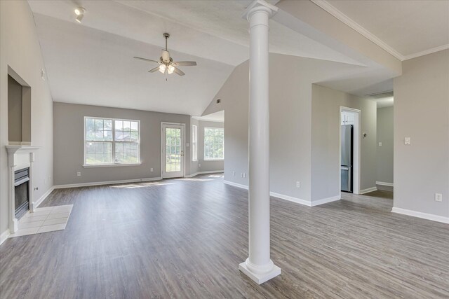 4620 Country Glen Cir, Grovetown, GA 30813 - unfurnished living room featuring a ceiling fan, wood finished floors, a fireplace with flush hearth, baseboards, and ornate columns