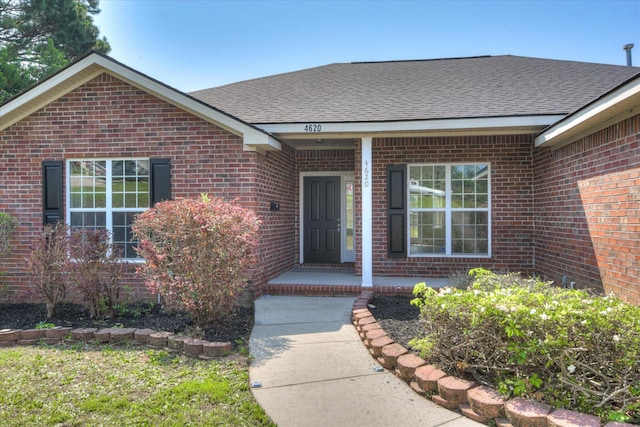 4620 Country Glen Cir, Grovetown, GA 30813 - view of exterior entry featuring brick siding and a shingled roof