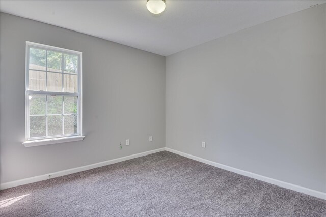 4620 Country Glen Cir, Grovetown, GA 30813 - spare room featuring carpet and baseboards