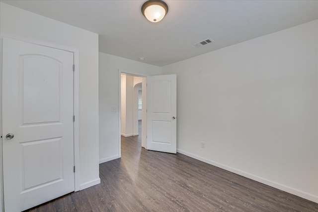 1586 Lee Beard Way, Augusta, GA 30901 - unfurnished bedroom with dark wood-type flooring and baseboards