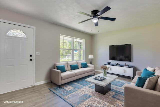 1608 Cider Ln, Augusta, GA 30906 - living area featuring wood finished floors, healthy amount of natural light, baseboards, and ceiling fan