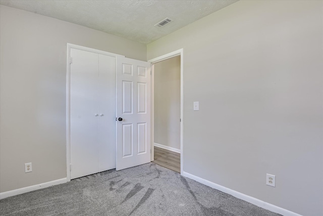 1608 Cider Ln, Augusta, GA 30906 - unfurnished bedroom featuring baseboards, carpet, and a closet