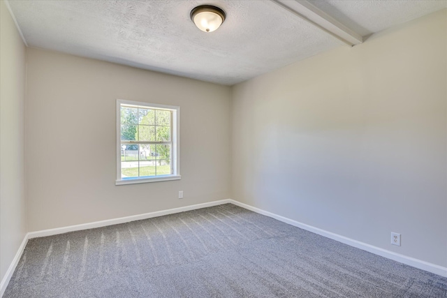 1608 Cider Ln, Augusta, GA 30906 - empty room featuring carpet, baseboards, a textured ceiling, and beam ceiling