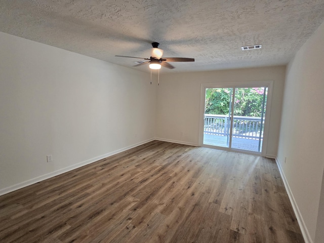 469 Lawrence Dr, Evans, GA 30809 - empty room featuring wood finished floors, a textured ceiling, and ceiling fan