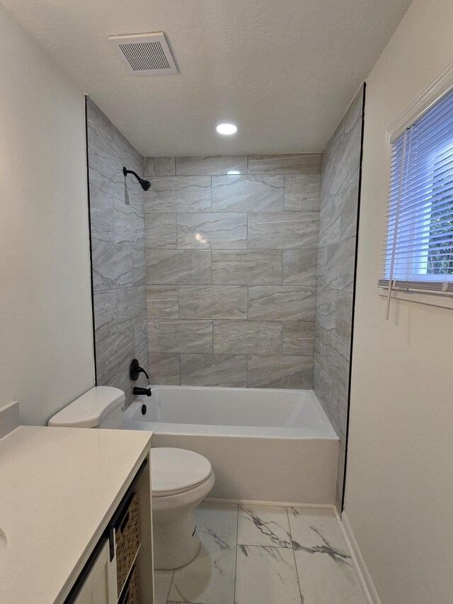 469 Lawrence Dr, Evans, GA 30809 - bathroom featuring vanity,  shower combination, marble look tile flooring, and recessed lighting