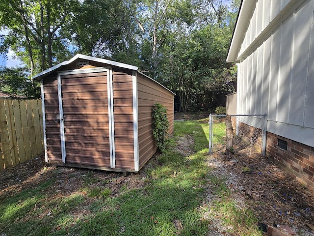 469 Lawrence Dr, Evans, GA 30809 - view of shed featuring a gate
