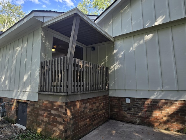 469 Lawrence Dr, Evans, GA 30809 - view of home's exterior with board and batten siding and crawl space