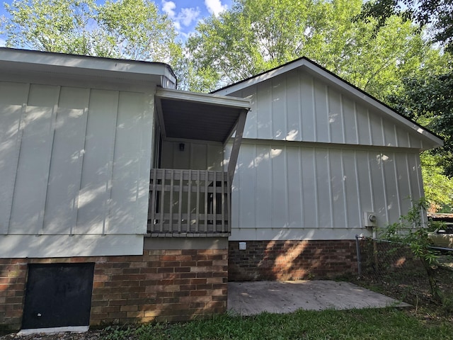 469 Lawrence Dr, Evans, GA 30809 - view of side of home with board and batten siding and crawl space