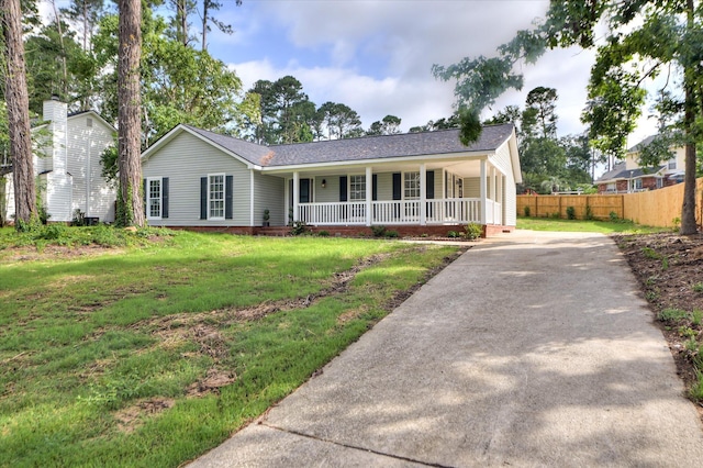 4171 Arlington Rd, Evans, GA 30809 - single story home featuring covered porch, concrete driveway, roof with shingles, and crawl space