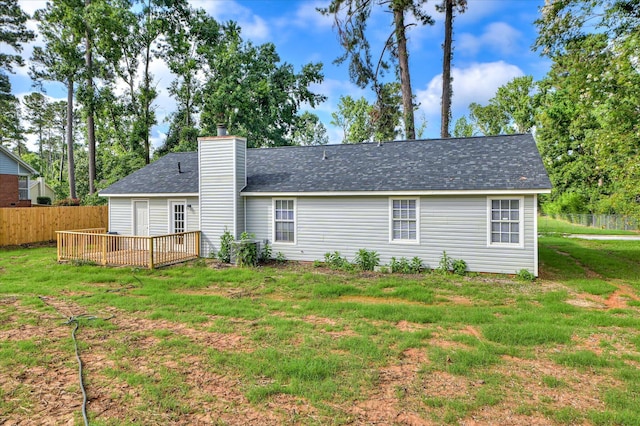 4171 Arlington Rd, Evans, GA 30809 - rear view of house featuring a chimney, a deck, and a shingled roof