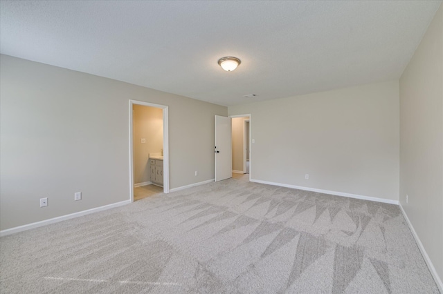 4171 Arlington Rd, Evans, GA 30809 - unfurnished bedroom featuring light colored carpet and ensuite bath