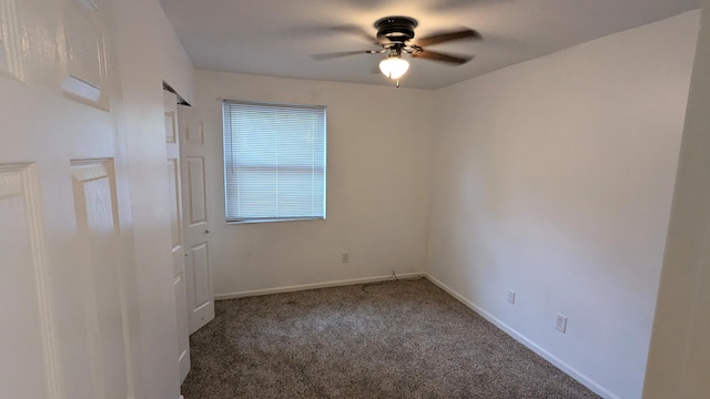 unfurnished room featuring carpet flooring and ceiling fan