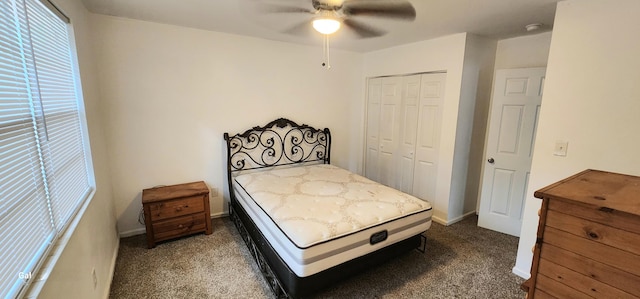 carpeted bedroom with a closet and ceiling fan