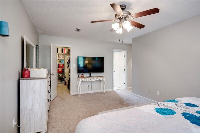 4478 Amanda Ct, Evans, GA 30809 - bedroom featuring a spacious closet, light carpet, and ceiling fan