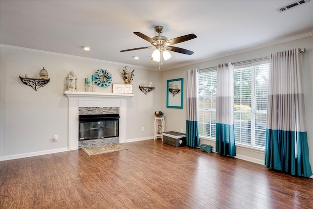 4478 Amanda Ct, Evans, GA 30809 - living area with crown molding, ceiling fan, a high end fireplace, and wood finished floors
