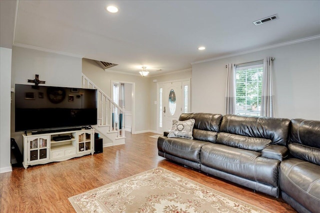 4478 Amanda Ct, Evans, GA 30809 - living room featuring stairs, wood finished floors, crown molding, and recessed lighting