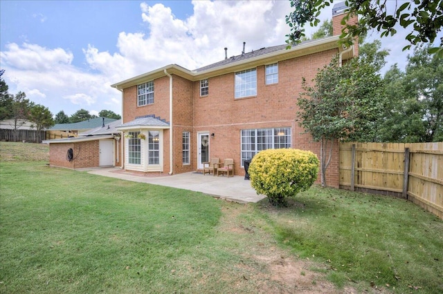 4478 Amanda Ct, Evans, GA 30809 - rear view of property featuring a patio area, brick siding, and a chimney