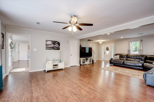 4478 Amanda Ct, Evans, GA 30809 - living room with ceiling fan, wood finished floors, and ornamental molding