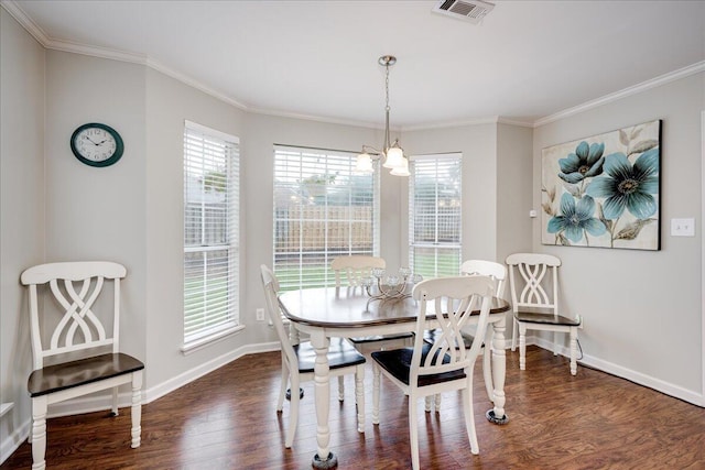 4478 Amanda Ct, Evans, GA 30809 - dining space featuring wood finished floors, ornamental molding, and plenty of natural light
