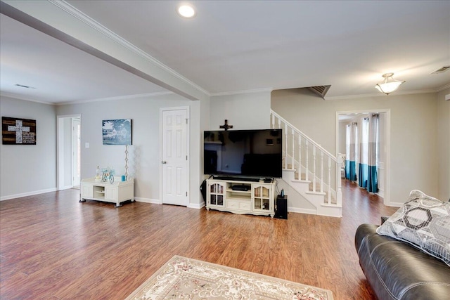 4478 Amanda Ct, Evans, GA 30809 - living room featuring stairway, crown molding, and wood finished floors