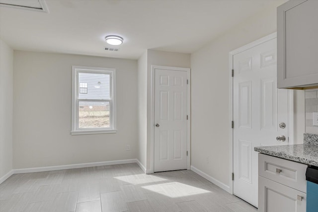 interior space featuring light stone countertops