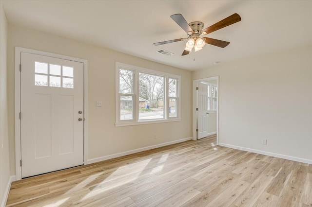 entryway with ceiling fan and light hardwood / wood-style flooring