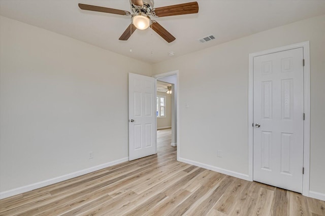 unfurnished bedroom featuring ceiling fan and light hardwood / wood-style floors