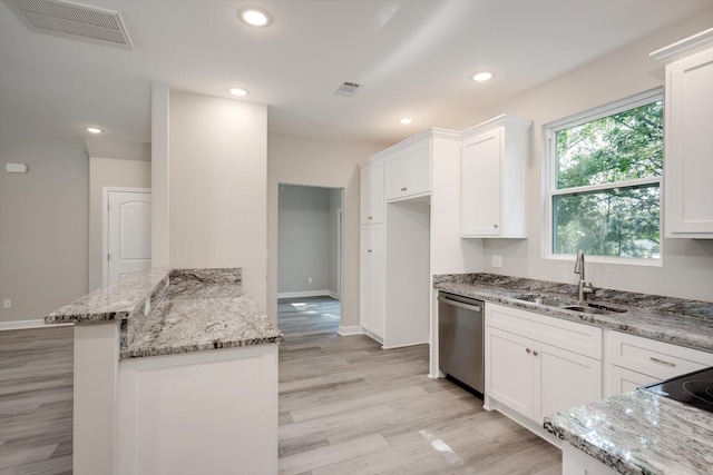 3605 Pebble Creek Dr, Hephzibah, GA 30815 - kitchen with dishwasher, a sink, light stone countertops, white cabinetry, and recessed lighting