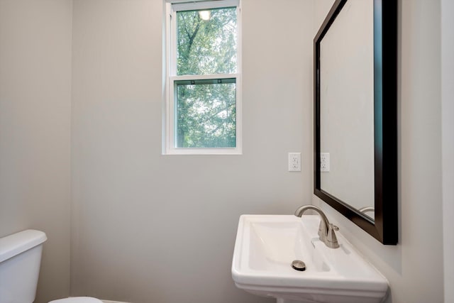 3605 Pebble Creek Dr, Hephzibah, GA 30815 - bathroom featuring toilet, healthy amount of natural light, and a sink