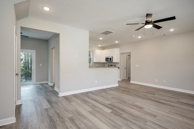 3605 Pebble Creek Dr, Hephzibah, GA 30815 - unfurnished living room with a ceiling fan, light wood-style flooring, baseboards, and recessed lighting