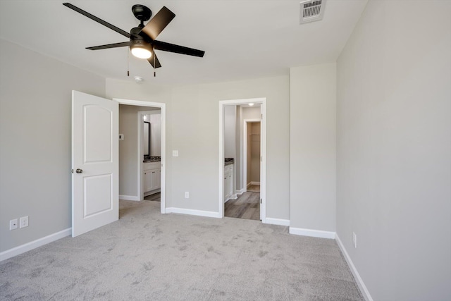 3605 Pebble Creek Dr, Hephzibah, GA 30815 - unfurnished bedroom featuring carpet, ensuite bath, baseboards, and a ceiling fan