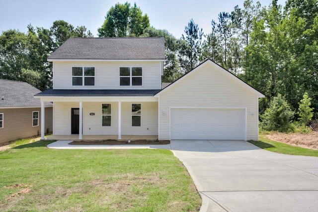 3605 Pebble Creek Dr, Hephzibah, GA 30815 - view of front of house with concrete driveway, an attached garage, a front yard, and covered porch